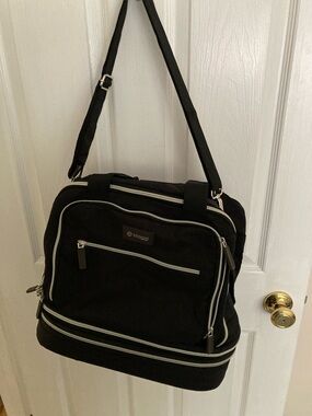 Biaggi Boost Max Compact Black Rolling Travel Bag with Smooth Wheels.